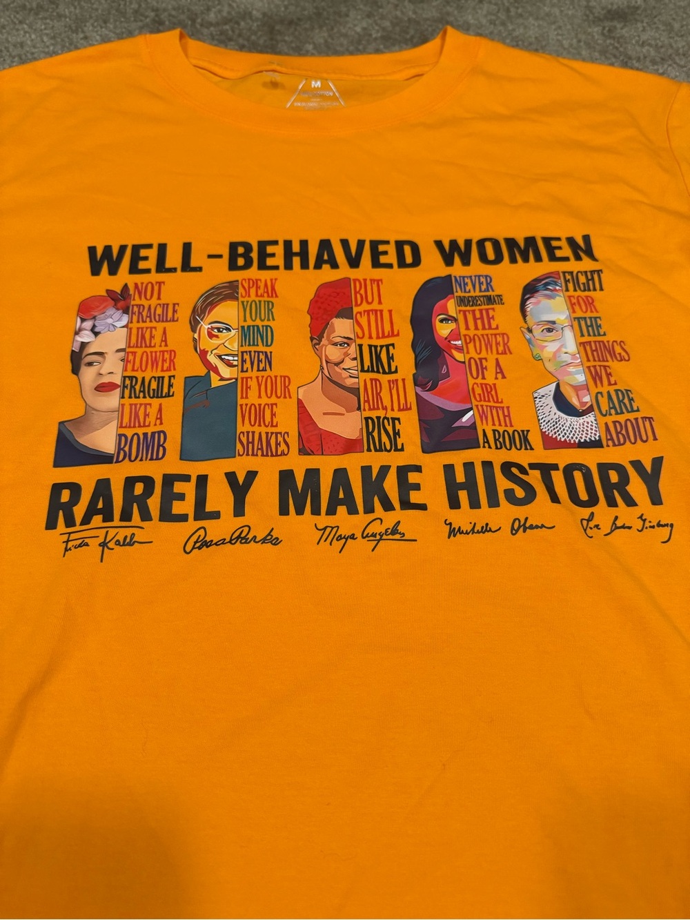 Source Unknown Orange Graphic Tee - "Well-Behaved Women Rarely Make History"